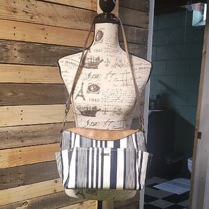 Elegant Black and White Striped Shoulder Bag with Tan Trim